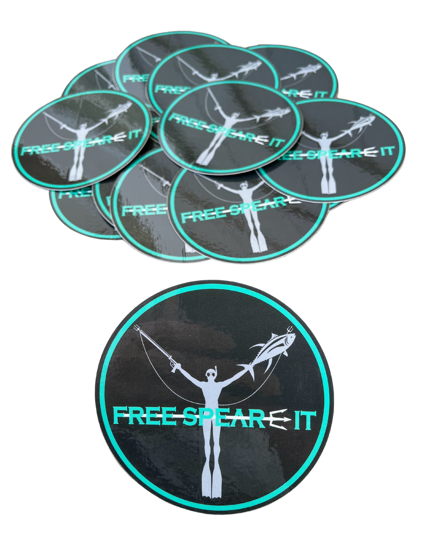 A stack of Free Spear-It round logo stickers featuring an aqua and black design with a freediver holding a speargun and fish. 